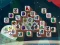 Gêm Among Mahjong Tiles ar-lein